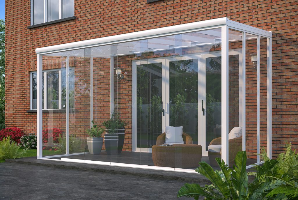 Image 5. 5x3m white aluminium frame garden room with 8mm laminated safety glass roof panels, 2 sets of 3 track doors and 1 set of split 3 track doors