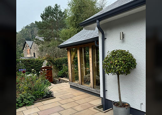 AX SnapFix Moulded Gutters and round downpipes in RAL 7015 Slate Grey Devon case study image 003